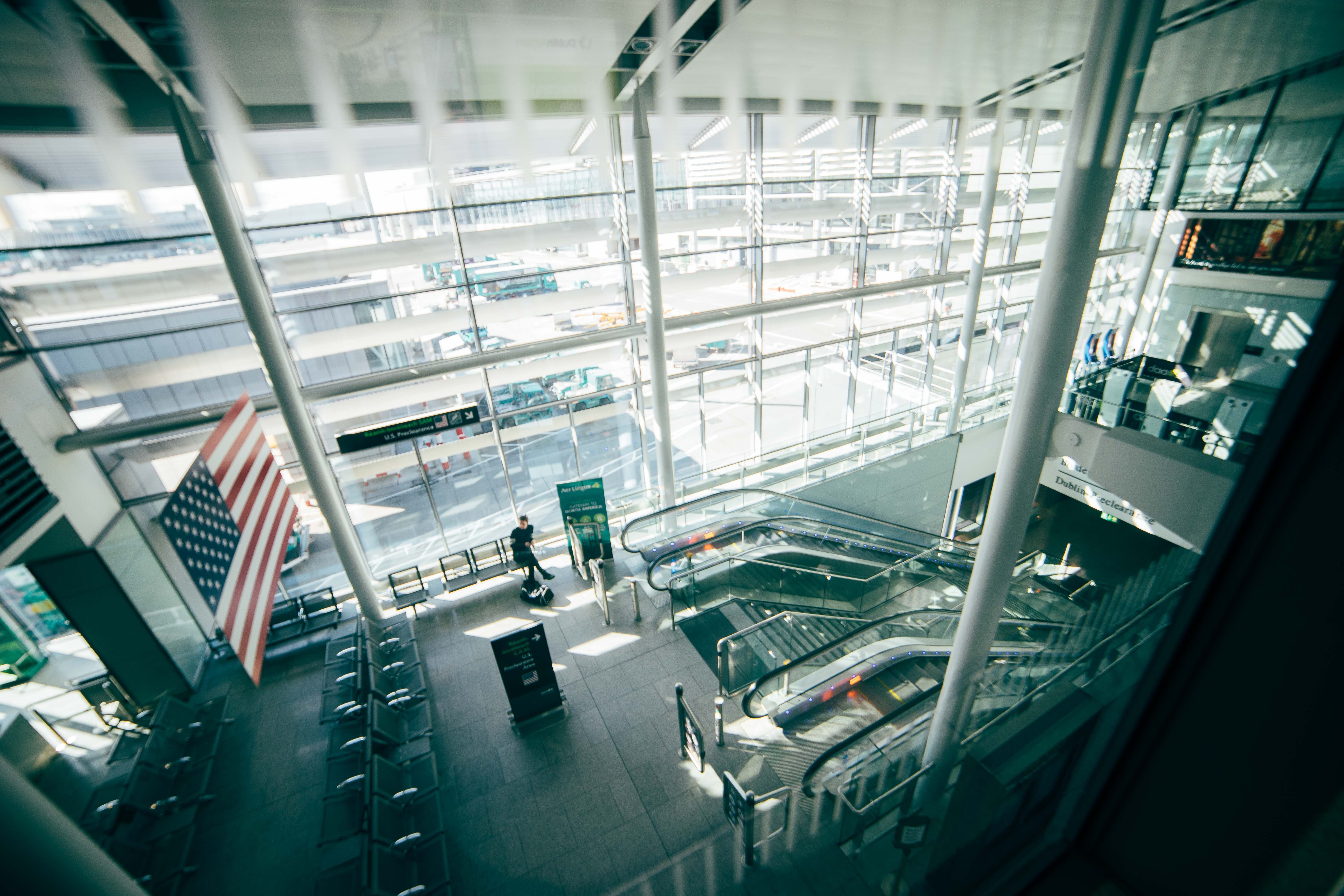Denver International Airport iconic white tensile roof structure under golden hour light