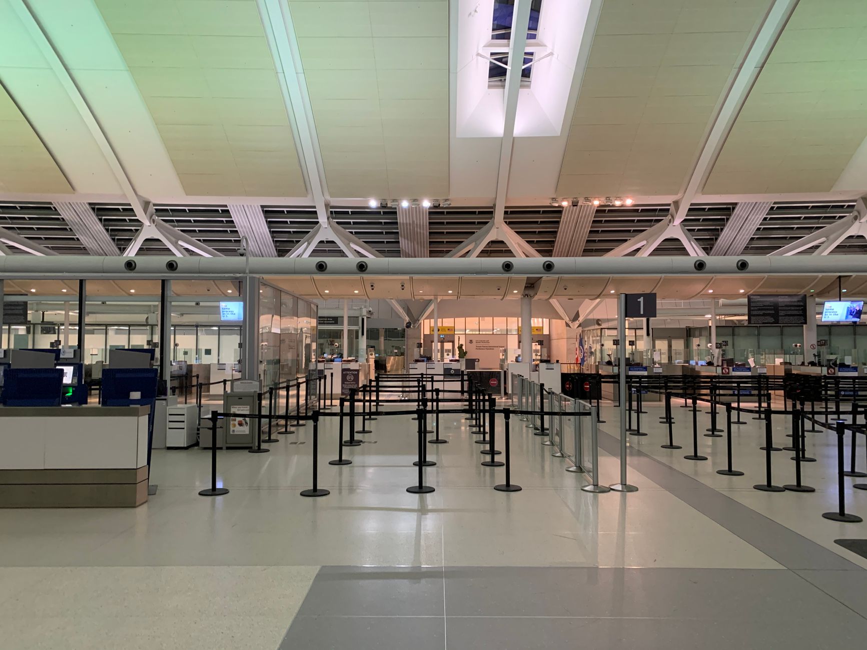 Passenger at airline service desk in Buffalo airport terminal
