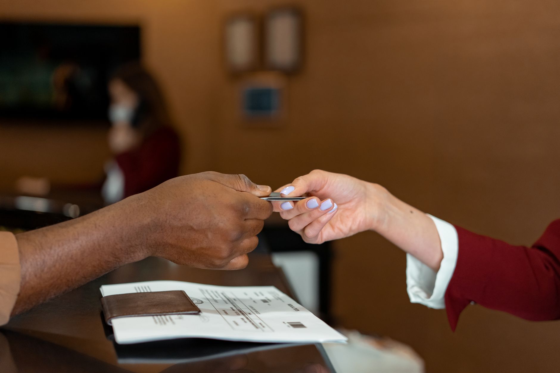 Airline staff at airport check in counter